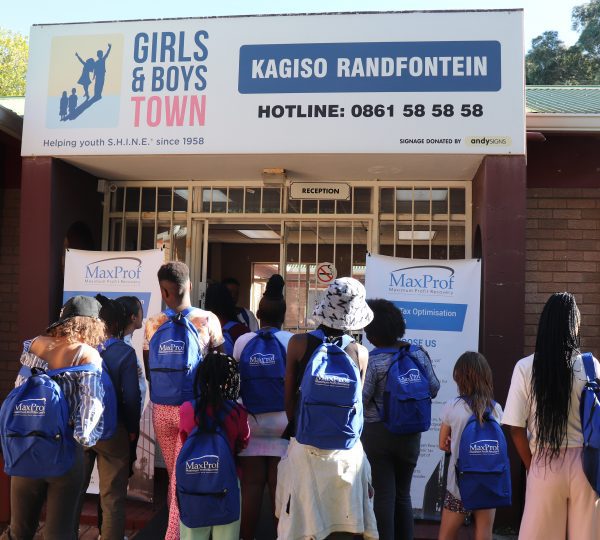 MaxProf's visit to the Girls and Boys Town to deliver backpacks and stationery sets